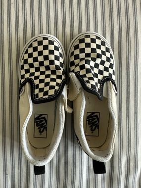 Vans Kids Checkerboard Slip-On Sneakers in Black & White
